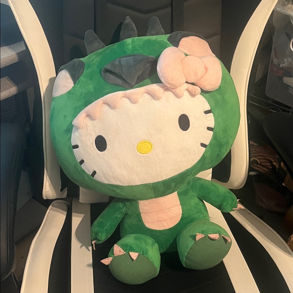 20 inch Hello Kitty Plush in Green Dinosaur Costume with Pink Bow